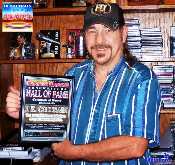 J.K.Coltrain holds the award received from the IDSS Hall Of Fame